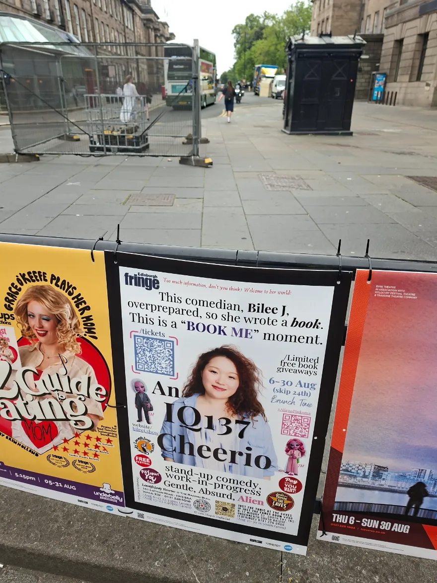 An IQ137 Cheerio banner on an Edinburgh street