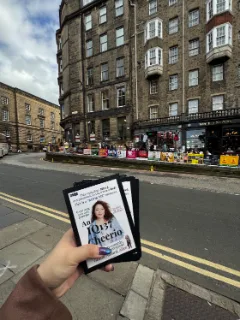 Flyers in hand on an Edinburgh street