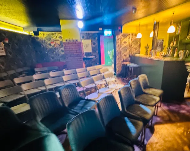Rows of empty chairs in the Cellar before the show